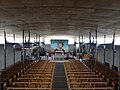 Photographie montrant l'intérieur de l'église du Sacré-Cœur de Bonnecousse, prise depuis la tribune de l'orgue