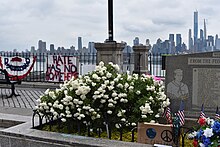 Protest signs at the World War I memorial in Weehawken World War I memorial in Weehawken, NJ with George Floyd signs, 6 June 2020.jpg