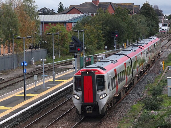 Transport for Wales' 197015 & 017 at Wrexham General with a service from Cardiff to Holyhead.