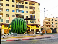 Watermelon sculpture at a roundabout in Jenin, Palestine (January 2021) dwr lbTykh@ jnyn.jpg