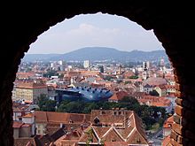 City overview from Schlossberg with Kunsthaus in the middle 07 Graz, Austria.jpg