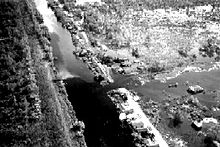 A hurricane in 1947 overwhelmed the existing levees along the outfall canals. Here, the 17th Street Canal is breached by hurricane storm surge.