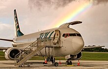 An Airwork Boeing 737-400F, operating for Toll Priority, at Christmas Island Airport (March 2016). Airwork Boeing 737-400F (ZK-JTQ) at Christmas Island Airport (1).jpg