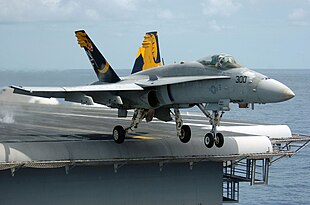 An F/A-18C Hornet launches from the flight deck of the aircraft carrier USS Kitty Hawk An F-A-18C Hornet launches from the flight deck of the conventionally powered aircraft carrier.jpg