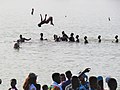 An acrobatic display of children swimming in northern Ghana 01