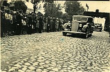 Interwar president Antanas Smetona riding in a Lincoln K series with license plate K1 in Ukmerge Antanas Smetona riding in a car in Ukmerge.jpg