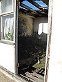 The interior of an abandoned holiday chalet, part of Atherfield Bay Holiday Centre, off the A3055 Military Road, Isle of Wight.   This file was uploaded with Commonist.