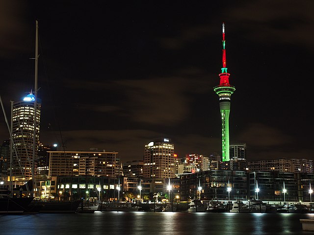 The tower illuminated in Christmas colours. Various other lighting schemes and colours are also used.