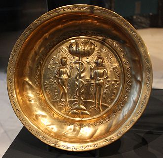 Repousse and chased brass dish with Adam and Eve, Germany 16th century BLW Hand beaten brass bowl.jpg