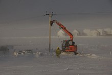 Repairing electricity cables in the wake of Xaver, Baltasound, Unst, Shetland. Baltasound repairs.jpg