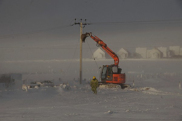 Repairing electricity cables in the wake of Xaver, Baltasound, Unst, Shetland.