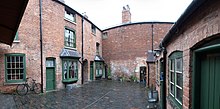 Panorama of the central courtyard Birmingham Back to Backs interior.jpg