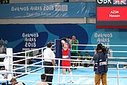 Deutsch: Boxen bei den Olympischen Jugendspielen 2018 Tag 12, 18. Oktober 2018 - Kampf um Bronze im Leichten Weltergewicht Jungen – Hassan Azim (Großbritannien, rot) schlägt Mohammed Boulaouja (Marokko, blau) RSC; Ringrichter ist Wulfren Olivares Peréz (Kolumbien). English: Boxing at the 2018 Summer Youth Olympics on 18 October 2018 – Bronze Medail Match Light Welterweight Boys - Hassan Azim (Great Britain, red) beats Mohammed Boulaouja (Morocco, blue) RSC; Referee is Wulfren Olivares Peréz (Columbia). Español: Boxeo en los Juegos Olímpicos Juveniles de Verano de 2018 en 18 de octubre de 2018 - Medalla de bronce de los hombres ligeros de peso welter: Hassan Azim (Gran Bretaña, rojo) vence a Mohammed Boulaouja (Marruecos, azul) RSC; El árbitro es Wulfren Olivares Peréz (Colombia).