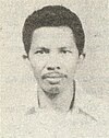 Black-and-white portrait of Budi Hardjono