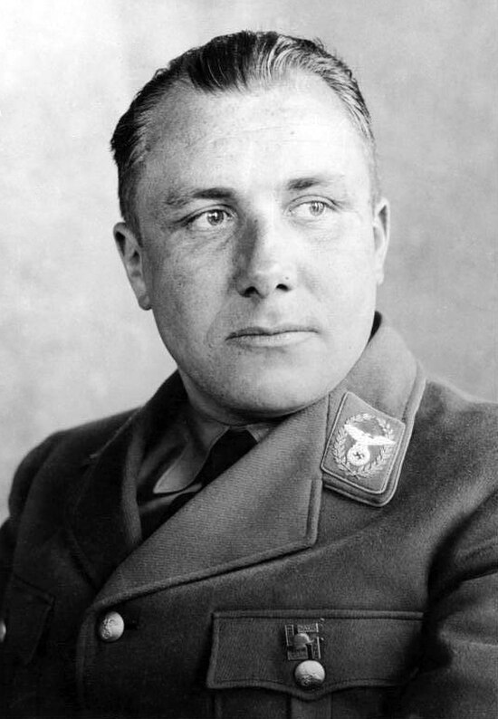 Bormann in 1934. A scar on his forehead has been edited out of this photograph.