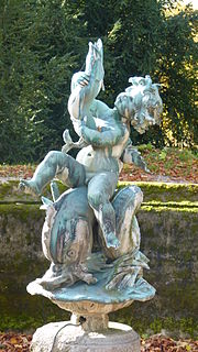 Putto statue in the Parc du Château de Ferney-Voltaire (Ferney-Voltaire, France)