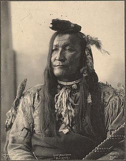 Chief Mountain, blackfeet. Photographié par Frank Rinehart en 1898.