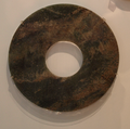 Disc made of jade, dating to the time of the Han dynasty. Circa 206 BC - 220 AD. Cat # 931.13.1 Bishop C. White Collection. From the Joey and Toby Tanenbaum Gallery of China at the Royal Ontario Museum.