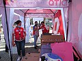 Dito Telecommunity workers selling SIM cards load in Glorietta Park temporary tents-shops 06