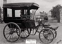A wagonette manufactured by Duncan & Fraser, outside the company's factory at 42 Franklin Street in 1905. This type was widely used to pick up passengers from horse trams. Duncan and Fraser wagonette (phaeton style) (SLSA B-14103-10).jpg