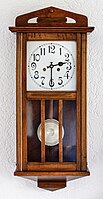 Rank: 29 Half past two on a pendulum wall clock