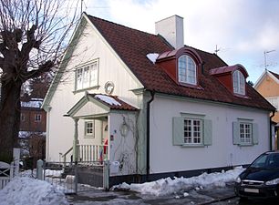 Dubbelhus i kv Gammelsmedjan, Mangebergsvägen 16, Enskededalen, byggdes 1919–1922.