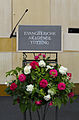 English: The standing desk with flowers in the rotunda of Evangelische Akademie Tutzing in Tutzing. Deutsch: Das Stehpult mit Blumen in der Rotunde der Evangelischen Akademie Tutzing.