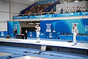 Deutsch: Fechten bei den Olympischen Jugend-Sommerspielen 2018: Tag 1, 7. Oktober 2018, Jungen, Säbel, Finale - Krisztián Rabb (HUN) - Hyun Jun (KOR) (USA) 15:13 English: Fencing at the 2018 Summer Youth Olympics at 7 October 2018 – Boys' sabre Gold medal match – Krisztián Rabb (HUN) Vs Hyun Jun (KOR) (USA) 15:13