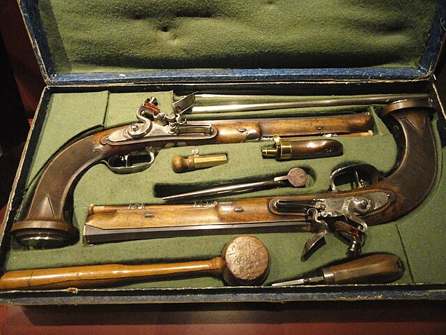 A pair of French rifled, flintlock, duelling pistols by Nicolas Noël Boutet 1794–1797. Royal Ontario Museum, Toronto, Canada. The set of accessories i