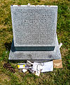 H. P. Lovecraft gravestone with offerings Swan Point Cemetery.jpg