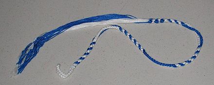 A karaite Ṣiṣit with blue threads