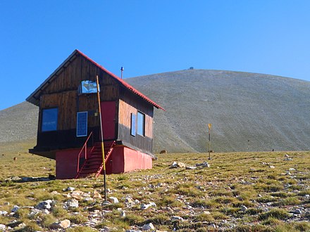 Emergency refuge of Kostas Migotzidis and at the top behind the refuge of Aghios Antonios