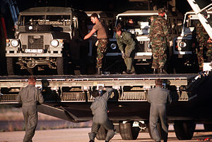 Crew unload landrovers in Grootfontein for use by Finnish UNTAG troops Land rovers offloading.jpg