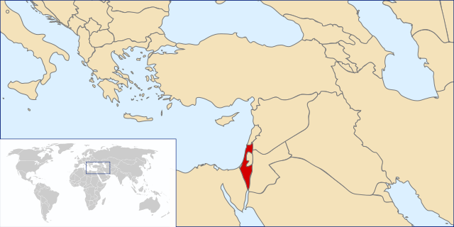 Political map of the Middle East with Israel in red. An inset shows a world map with the main map's edges outlined.