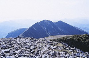 The full Caher Ridge, showing Caher (the tallest middle peak), and Caher West Top (rightmost peak), as seen from Carrauntoohil's summit