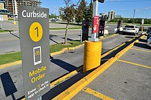 A curbside pickup at a McDonald's drive-thru during the COVID-19 pandemic McDonaldsCurbsidePickupMarkhamTownSquare.jpg