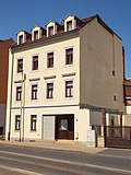 House originally in closed development, with a rear building