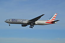 An American Airlines Boeing 777-200ER in Oneworld livery in 2014.