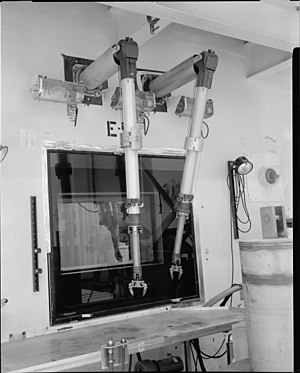 Manipulator arms inside the Hot Bay of the Engine Maintenance Assembly & Disassembly Facility, in Area 25 of the Nevada Test Site. NTS - EMAD Facility 009.jpg