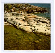 Oblique view of roches moutonnees surface at Great Slave Lake, Nunavut, Canada.jpg