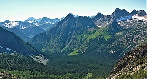 Whistler Mountain centered. Cutthroat Peak in upper right. Paraglider in Blue Lake basin.jpg