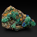 Complete and partial pseudomorphs of malachite over azurite spherical crystals. Winner of the General category 2021, Masha Milshina, Russia