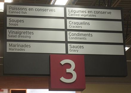 A bilingual sign in a Quebec supermarket