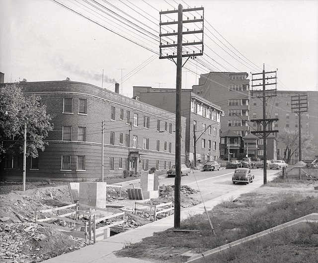 Former section of Queen St. west of Roncesvalles Ave. in 1956, before becoming absorbed into The Queensway, which is under construction at bottom left
