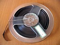 A seven-inch reel of
.mw-parser-output .frac{white-space:nowrap}.mw-parser-output .frac .num,.mw-parser-output .frac .den{font-size:80%;line-height:0;vertical-align:super}.mw-parser-output .frac .den{vertical-align:sub}.mw-parser-output .sr-only{border:0;clip:rect(0,0,0,0);clip-path:polygon(0px 0px,0px 0px,0px 0px);height:1px;margin:-1px;overflow:hidden;padding:0;position:absolute;width:1px}
1/4 in (6.4 mm) tape Reelt ubt.jpeg