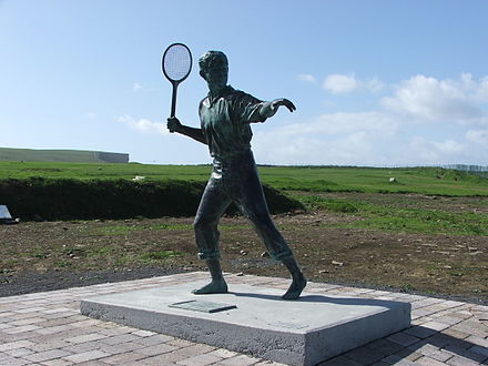 A statue in Kilkee, Ireland, of the young Harris playing squash