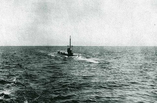 Black and white photo of a surfaced WWI submarine