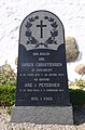 Headstone by the church.