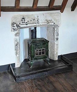 When this fireplace -- broken and covered in lime-wash -- was discovered in 1995, no one had seen this style of decoration before. Consequently, the Merchant's House was regraded as a 2* from a grade 2. South bed chamber fireplace.jpg