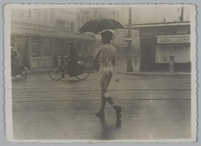 A nude Dutch protestor in 1941, demonstrating against the Germans' clothing rations